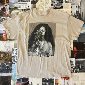Her cream and black tee